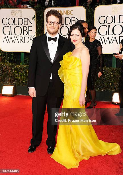 Actor Seth Rogen and Lauren Miller arrive at the 69th Annual Golden Globe Awards held at the Beverly Hilton Hotel on January 15, 2012 in Beverly...