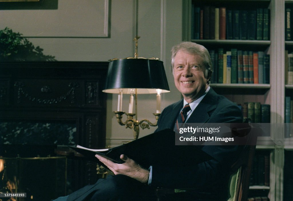 Jimmy Carter delivers his Fireside Chat from the library in the White House. ca. 1 February 1978
