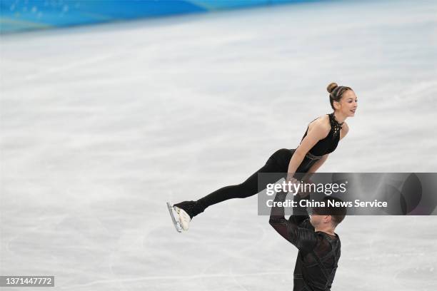 Hailey Kops and Evgeni Krasnopolski of Team Israel skate during the Pair Skating Short Program on day fourteen of the Beijing 2022 Winter Olympic...