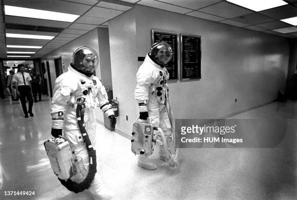 Apollo 10 astronauts John W. Young , command module pilot; and Thomas P. Stafford, commander, leave the Kennedy Space Center's Manned Spacecraft...