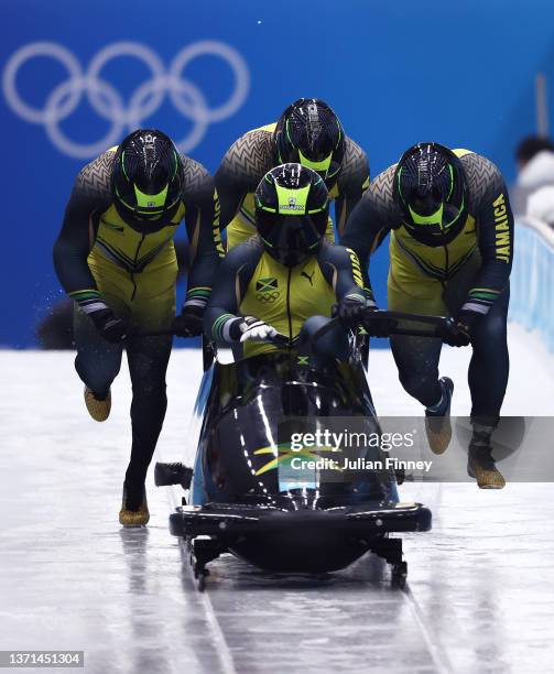 Shanwayne Stephens, Ashley Watson, Rolando Reid and Matthew Wekpe of Team Jamaica slide during the four-man Bobsleigh heats on day 15 of Beijing 2022...