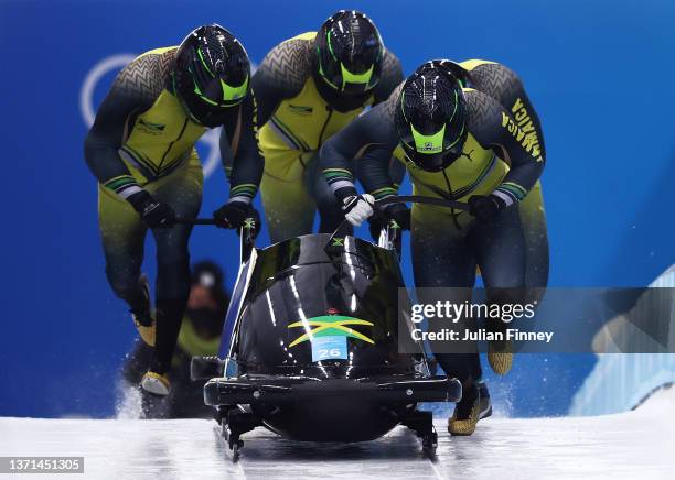 Shanwayne Stephens, Ashley Watson, Rolando Reid and Matthew Wekpe of Team Jamaica slide during the four-man Bobsleigh heats on day 15 of Beijing 2022...