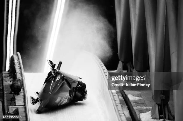 Brad Hall and Nick Gleeson of Team Great Britain crash during the 2-man Bobsleigh Heat 3 on day 11 of Beijing 2022 Winter Olympic Games at National...