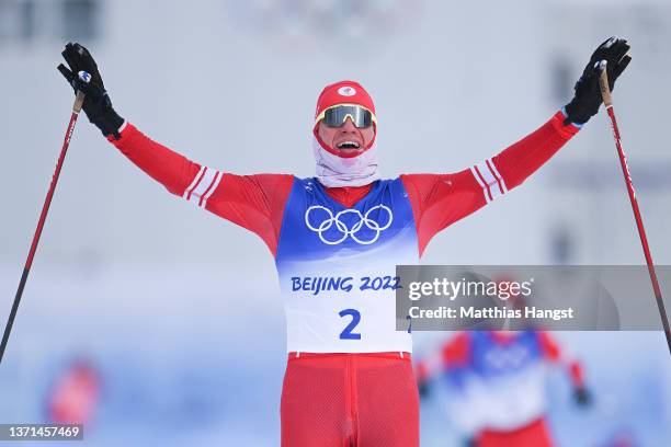 Alexander Bolshunov of Team ROC celebrates winning the Gold medal during the Men's Cross-Country Skiing 50km Mass Start Free on Day 15 of the Beijing...