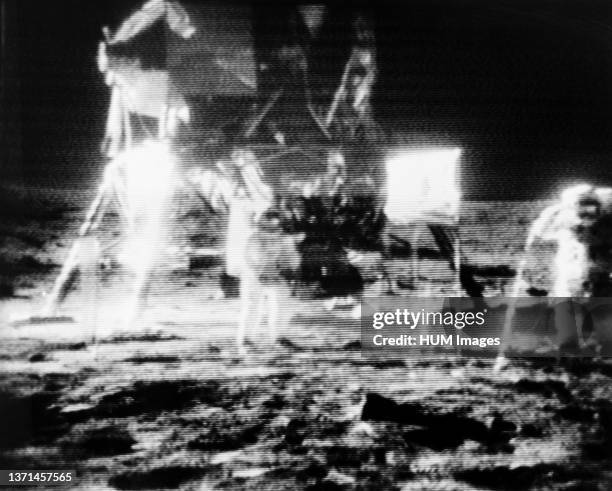 Black and white reproduction taken from a telecast by the Apollo 11 lunar surface camera.