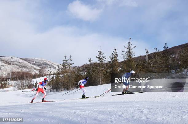Snorri Eythor Einarsson of Team Iceland, Naoto Baba of Team Japan and Candide Pralong of Team Switzerland compete during the Men's Cross-Country...