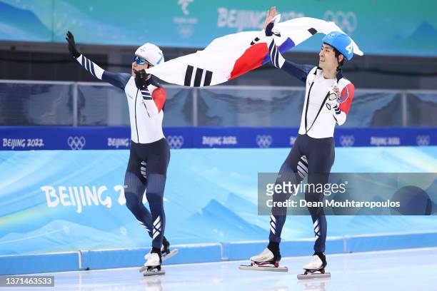 Jae Won Chung of Team South Korea celebrates winning the Silver medal as Seung Hoon Lee of Team South Korea celebrates winning the Bronze medalduring...