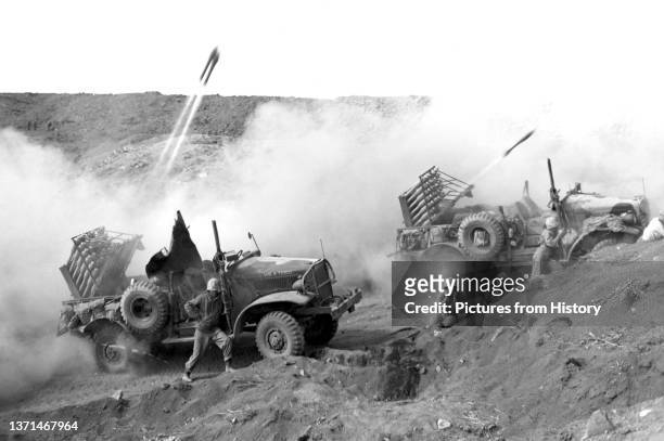Marines using mobile rocket launchers, Battle of Iwo Jima, March 1945.