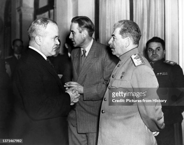 Vyacheslav Molotov chats with Joseph Stalin , Averell Harriman, United States Ambassador to the Soviet Union 1943-1946 at the Yalta Conference,...