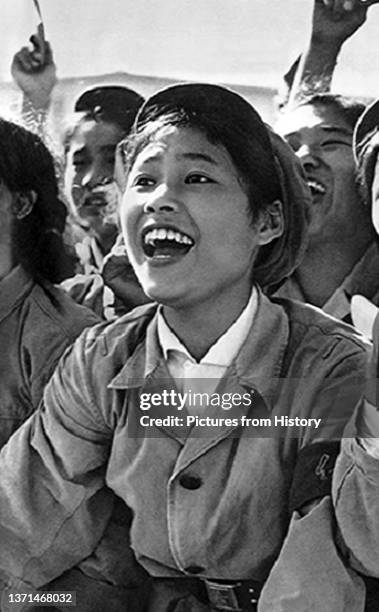 An enthusiastic young female 'Red Guard' shouts slogans at a cultural revolution rally, Beijing, c. 1966.