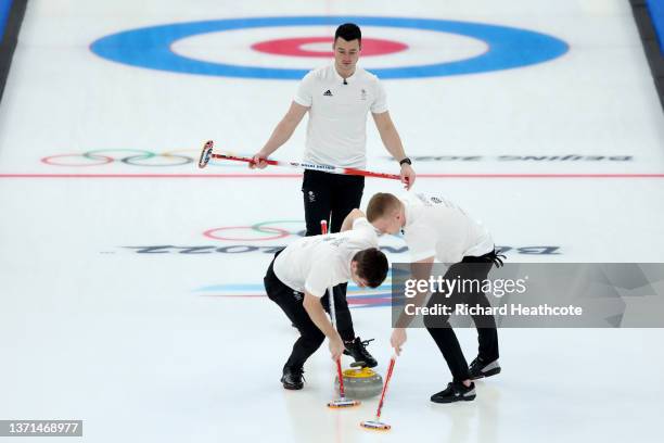 Hammy McMillan of Team Great Britain competes against Team Sweden during the Men's Curling Gold Medal Game on Day 14 of the Beijing 2022 Winter...