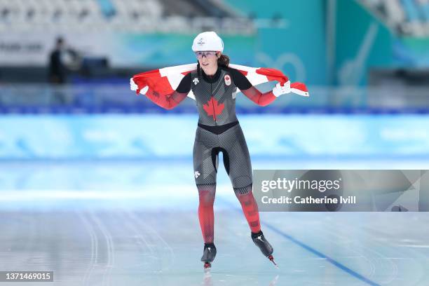 Ivanie Blondin of Team Canada celebrates winning the Silver medal during the Women's Mass Start Final on day fifteen of the Beijing 2022 Winter...