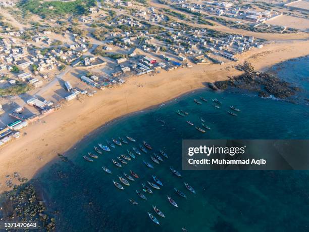 aerial photograph of fishing port soanari near mubarak village - karachi stock pictures, royalty-free photos & images