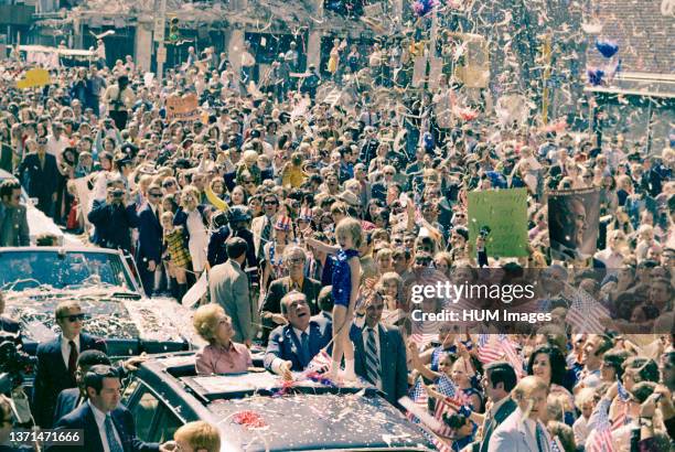 October 12, 1972. President Nixon and Pat Nixon standing and waving to the crowd during a campaign stop in Atlanta, Georgia.