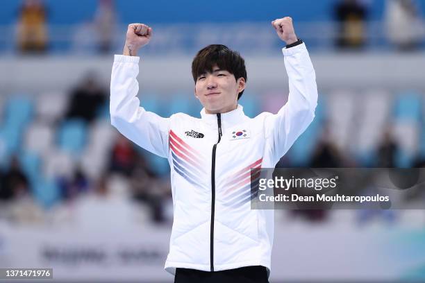 Silver Medallist Jae Won Chung of Team South Korea poses during the Men's Mass Start Final flower ceremony on day fifteen of the Beijing 2022 Winter...