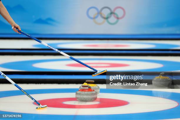 Detailed view of a Team Sweden curling brush is seen as Team Sweden compete against Team Great Britain during the Men's Curling Gold Medal Game on...