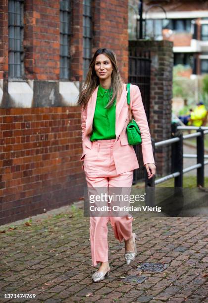 Isabella Charlotta Poppius is seen wearing rose suit, green bag, green blouseoutside Bora Aksu during London Fashion Week February 2022 on February...