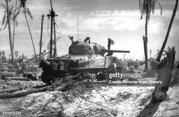 Sherman tank pauses during the Battle of Iwo Jima, March 1945.