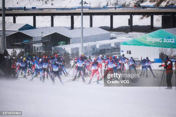 Athletes compete during the Men's Cross-Country Skiing 50km Mass Start Free on Day 15 of the Beijing 2022 Winter Olympics at The National...