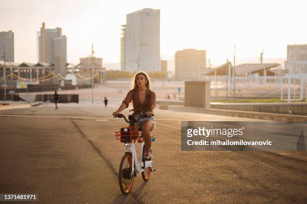 leaving the city behind her - hot spanish women stock pictures, royalty-free photos & images