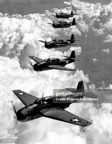 Grumman TBF Avenger torpedo bombers of the USAAF flying in formation over the Pacific, c. 1943.