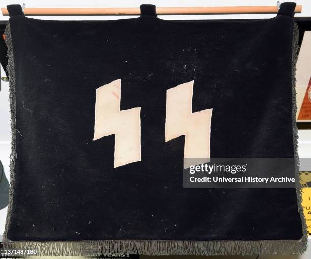 Flag of the Schutzstaffel , a major paramilitary organization under Adolf Hitler and the Nazi Party in Nazi Germany, and later throughout...