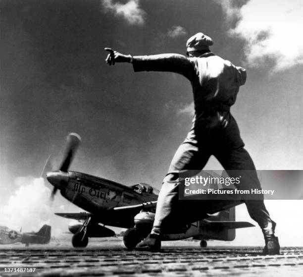 Takes off from Iwo Jima, early 1945.