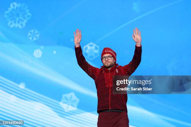 Silver Medallist Laurent Dubreuil of Team Canada celebrates during the Men's 1000m medal ceremony on Day 15 of the Beijing 2022 Winter Olympic Games...