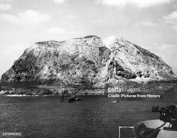 Mount Suribachi immediately after the Japanese surrender, Battle of Iwo Jima, 27 March 1945.