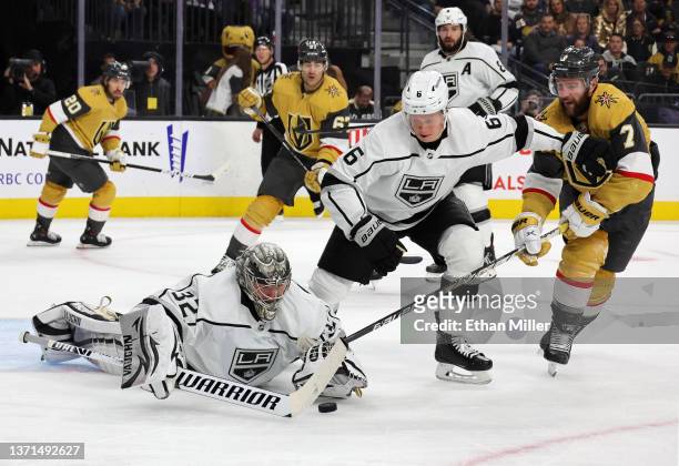 Jonathan Quick of the Los Angeles Kings makes a save as Olli Maatta of the Kings defends against Alex Pietrangelo of the Vegas Golden Knights in the...