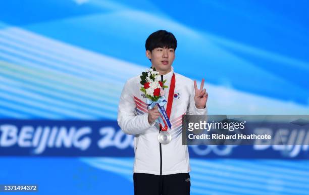 Silver Medallist Jae Won Chung of Team South Korea poses with their medal during the Men's Mass Start medal ceremony on Day 15 of the Beijing 2022...