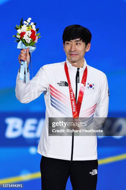 Bronze Medallist Seung Hoon Lee of Team South Korea poses with their medal during the Men's Mass Start medal ceremony on Day 15 of the Beijing 2022...