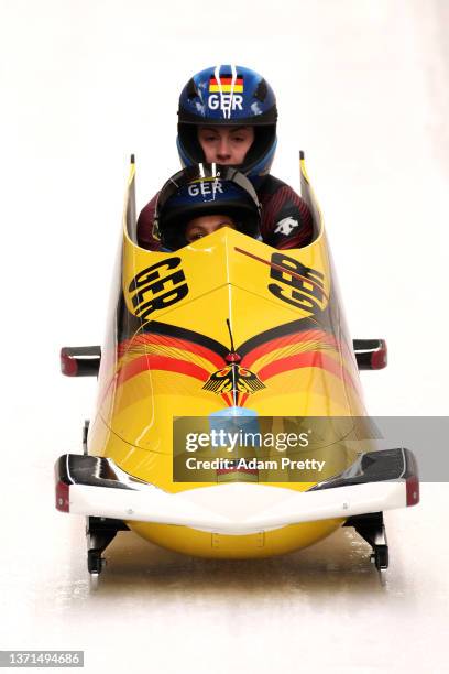 Mariama Jamanka and Alexandra Burghardt of Team Germany slide during the 2-woman Bobsleigh Heat 3 on day 15 of Beijing 2022 Winter Olympic Games at...
