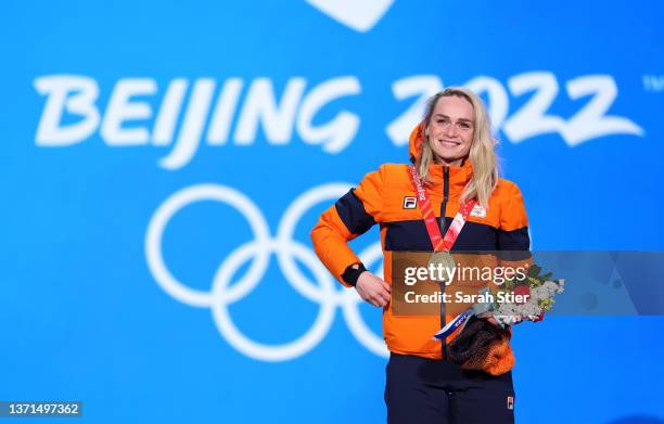 Gold medallist Irene Schouten of Team Netherlands poses with their medal during the Women's Mass Start medal ceremony on Day 15 of the Beijing 2022...