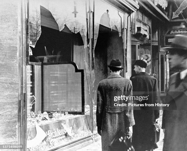 Shattered storefront of a Jewish-owned shop destroyed during Kristallnacht, Berlin, 1938.