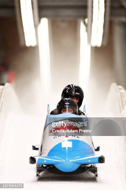 Melissa Lotholz and Sara Villani of Team Canada slide during the 2-woman Bobsleigh Heat 3 on day 15 of Beijing 2022 Winter Olympic Games at National...