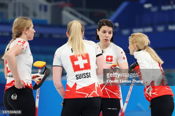 Esther Neuenschwander of Team Switzerland talks to teammates while competing against Team Sweden during the Women's Bronze Medal Game on Day 14 of...