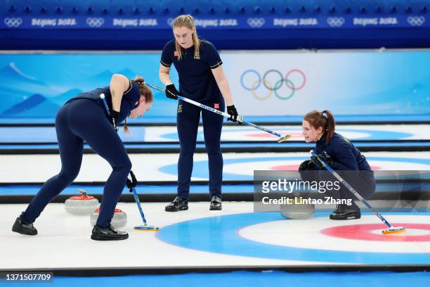 Agnes Knochenhauer, Sara Mcmanus and Anna Hasselborg of Team Sweden compete against Team Switzerland during the Women's Bronze Medal Game on Day 14...