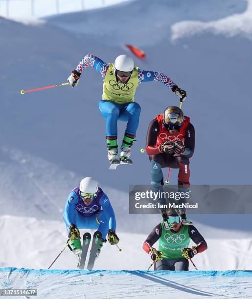 Brady Leman of Team Canada leads in the first semi final during the Men's Ski Cross on Day 14 of the Beijing 2022 Winter Olympics at Genting Snow...