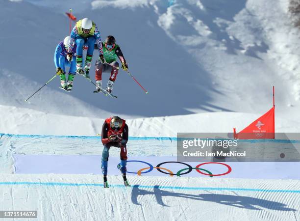 Brady Leman of Team Canada leads in the first semi final during the Men's Ski Cross on Day 14 of the Beijing 2022 Winter Olympics at Genting Snow...