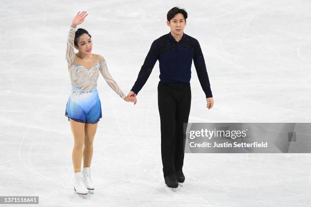 Wenjing Sui and Cong Han of Team China react after skating during the Pair Skating Free Skating on day fifteen of the Beijing 2022 Winter Olympic...