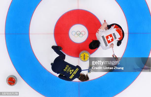 Esther Neuenschwander of Team Switzerland and Anna Hasselborg of Team Sweden compete during the Women's Bronze Medal Game on Day 14 of the Beijing...