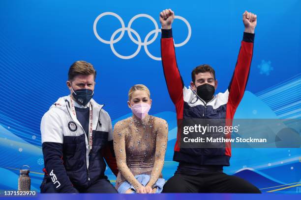 Alexa Knierim and Brandon Frazier of Team United States react to their score during the Pair Skating Free Skating on day fifteen of the Beijing 2022...