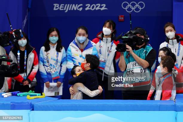 Wenjing Sui and Cong Han of Team China celebrate after winning the Gold medal during the Pair Skating Free Skating on day fifteen of the Beijing 2022...