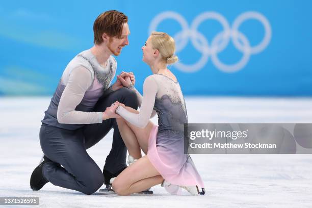 Evgenia Tarasova and Vladimir Morozov of Team ROC react after skating during the Pair Skating Free Skating on day fifteen of the Beijing 2022 Winter...