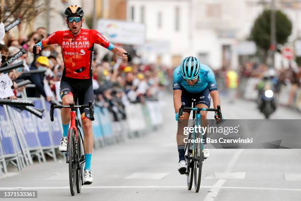 Wouter Poels of Netherlands and Team Bahrain Victorious celebrates winning ahead of Alexey Lutsenko of Kazahkstan and Team Astana – Qazaqstan during...