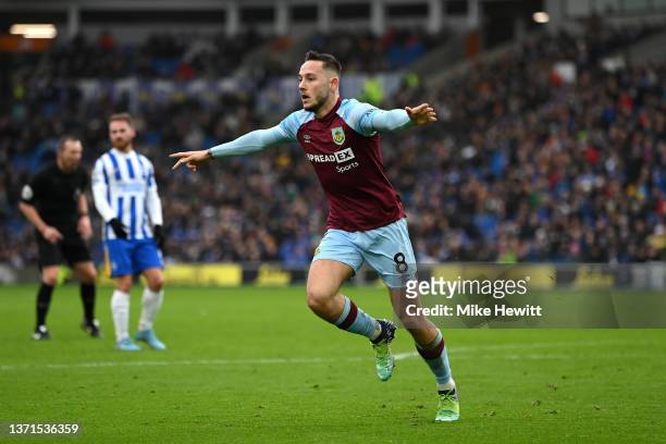 Josh Brownhill of Burnley celebrates after scoring their side's second goal during the Premier League match between Brighton & Hove Albion and...