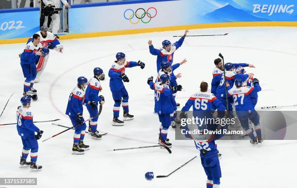 Team Slovakia celebrates a victory after the Men's Ice Hockey Bronze Medal match between Team Sweden and Team Slovakia on Day 15 of the Beijing 2022...