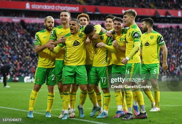 Milot Rashica celebrates with teammates Teemu Pukki, Max Aarons, Brandon Williams and Grant Hanley of Norwich City after scoring their team's first...
