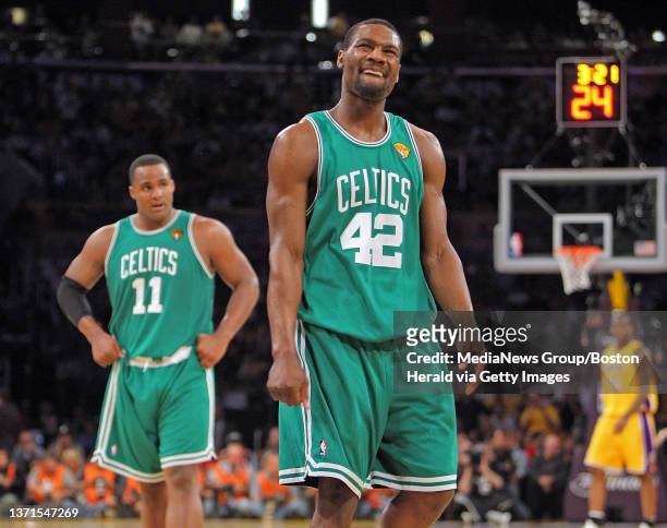 Boston Celtics guard Tony Allen and forward Glen Davis show their mood as they loose to the Lakers in the fourth quarter of Game 6 of the NBA Finals...
